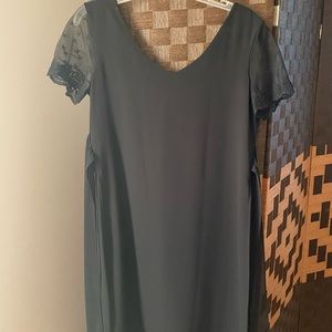 Short sleeve tie back dress, with intricate sleeves, and sheer slits on the side